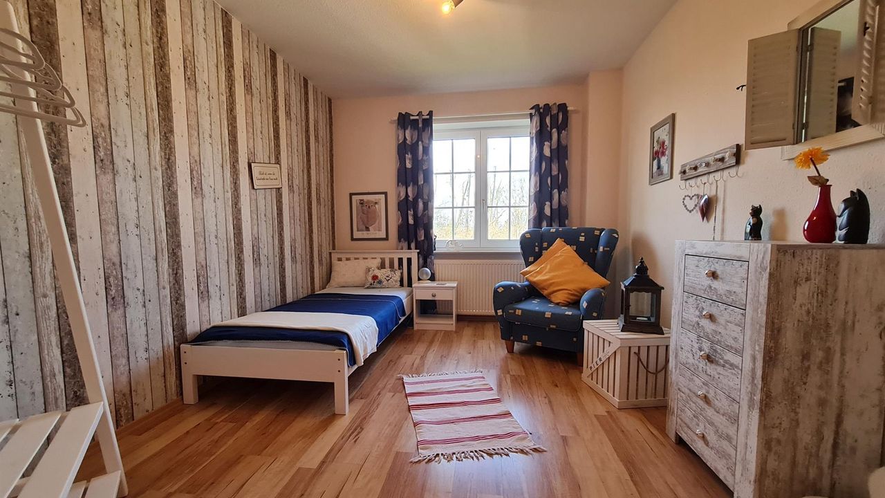 Schlafzimmer mit einem Einzelbett Schlafzimmer mit einem Einzelbett